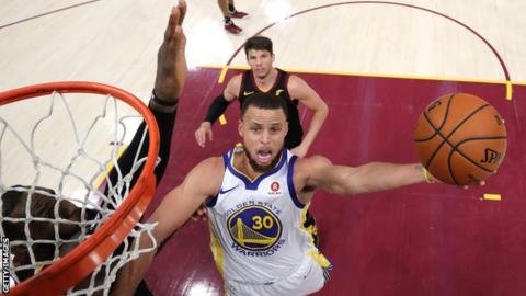 Stephen Curry scores for the Golden State Warriors
