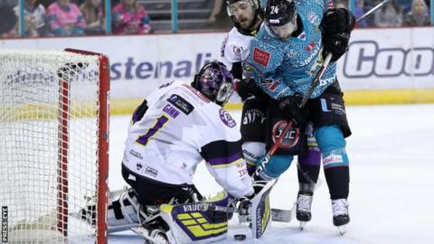 Giants forward Jonathan Ferland attempts to find a way past Storm netminder Matt Ginn