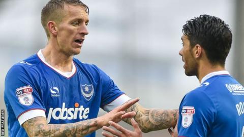 Portsmouth midfielders Carl Baker and Danny Rose