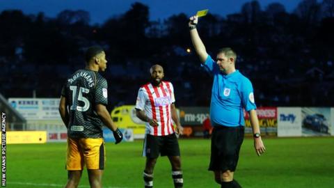 Newport sub Tristan Abrahams was one of eight players to be shown a yellow card by referee Brett Huxtable in a fiery encounter