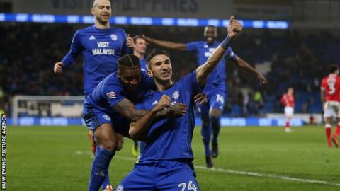 Marko Grujic celebrates scoring a goal with Kadeem Harris of Cardiff City in their 2-1 win over Barnsley.