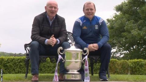 Donegal boss Declan Bonner and Cavan manager Mickey Graham with the Anglo-Celt trophy