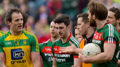 Donegal's Michael Murphy talks to Mayo's Aidan O'Shea after last year's Division One game