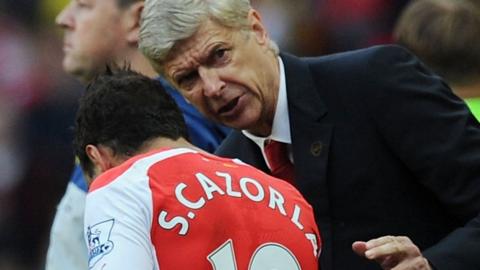 Arsene Wenger and Santi Cazorla