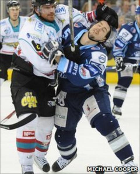 Belfast's Brandon Benedict and Brian Lee battle for possession