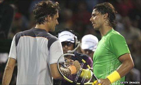 Roger Federer (left) shakes hands with Rafael Nadal after his defeat in Miami