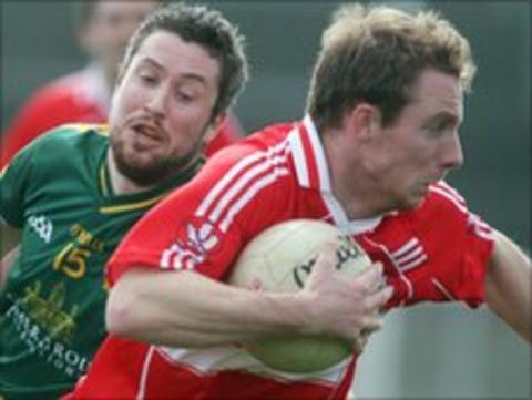 Sean Leo McGoldrick moves clear of Cian Ward in the league game