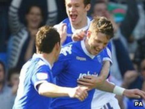 Greg Halford (centre) equalised for Portsmouth
