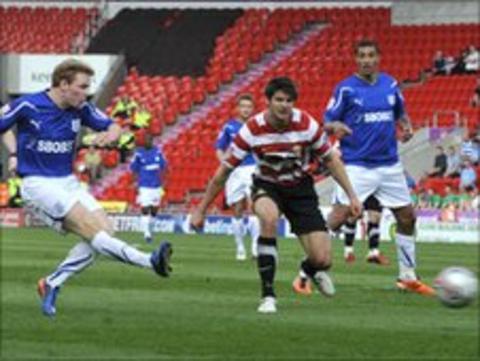 Chris Burke scores Cardiff's opener at Doncaster