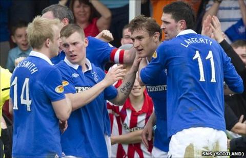 Jelavic (second right) won Rangers the game from an excellent free-kick