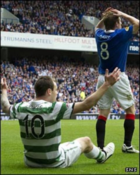 Anthony Stokes wins a penalty after a challenge from Steven Davis