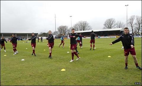 Motherwell players warm up at Stair Park