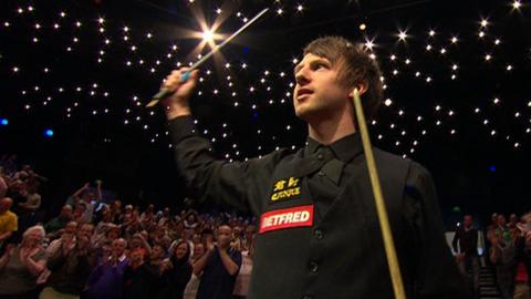 Judd Trump salutes the Crucible after beating Ding Junhui in the semi-final