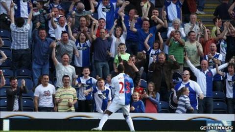 Blackburn supporters celebrate a goal against Birmingham on 9 April