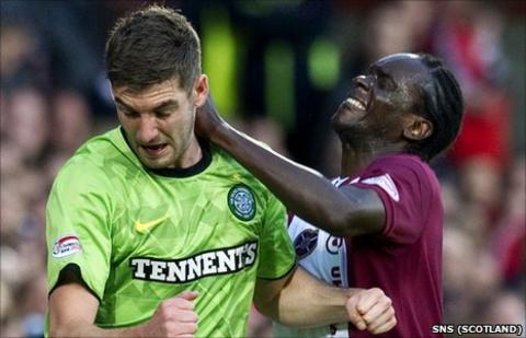 Celtic's Charlie Mulgrew and David Obua of Hearts