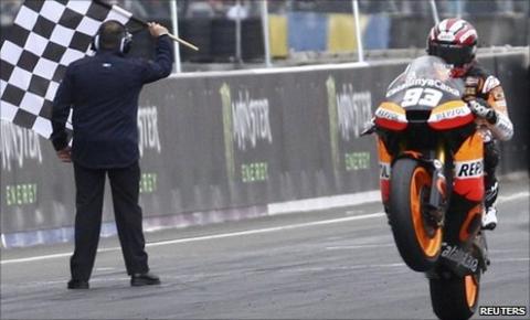 Suter's Moto2 rider Marc Marquez of Spain crosses the finish line of the MotoGP French motorcycling Grand Prix at the Le Mans circuit
