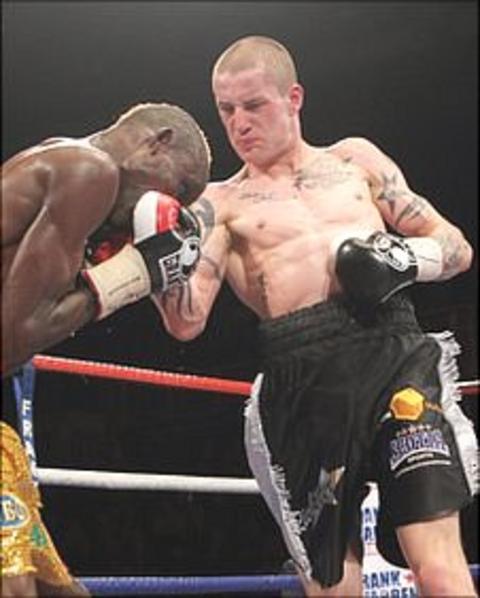 Ricky Burns in action against Joseph Laryea