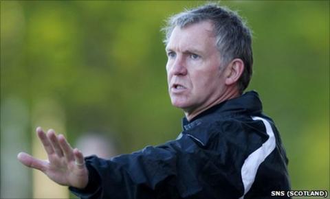 Queen of the South manager Kenny Brannigan