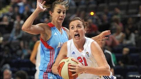 Rose Anderson drives past Shalee Lehning