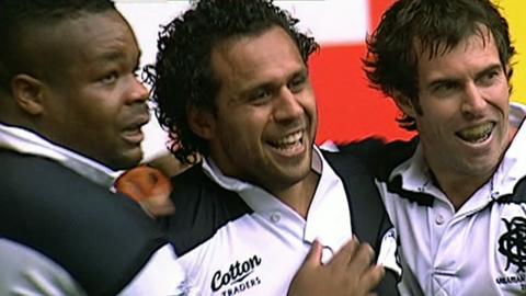 Barbarian players celebrate Isa Nacewa's match-winning try