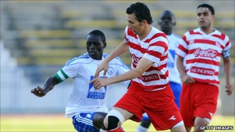 Captain of Kenyan club Sofapaka James Situma (in white) in action against Club Africain