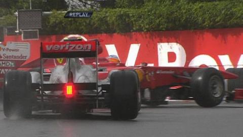 Button collides with Alonso