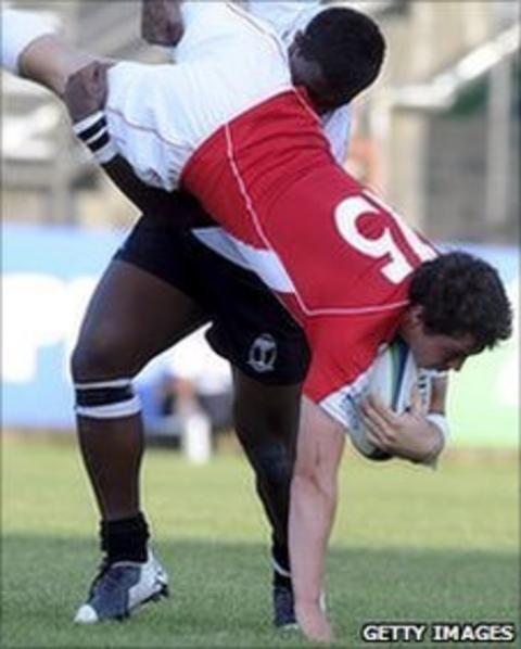 Wales U20's Ross Jones is tackled by Fiji U20's Solomoni Rosolea