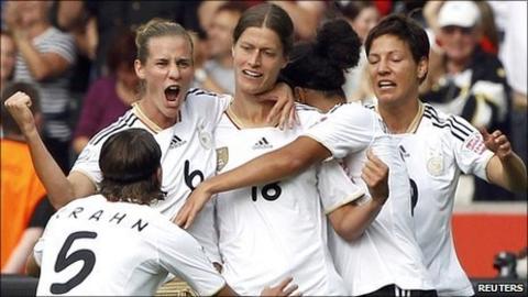 Germany celebrate Garefrekes' opening goal against Canada