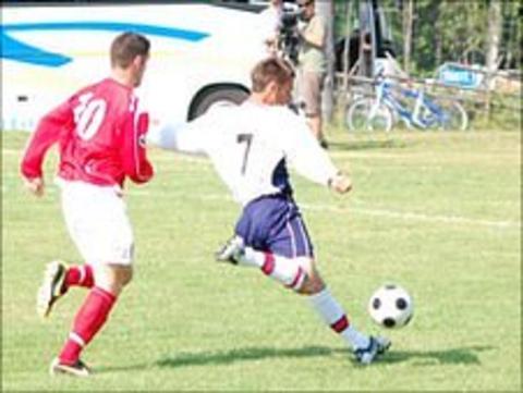 Guernsey (in white) play Jersey in the 2009 Island Games
