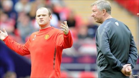 Manchester United striker Wayne Rooney and manager Sir Alex Ferguson