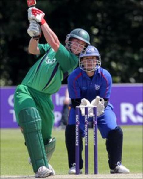 John Mooney (left) and Namibia wicketkeeper Ewald Steenkamp