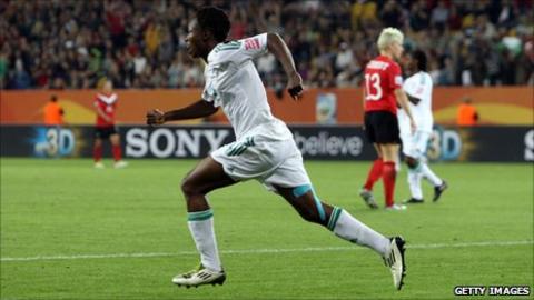 Nigeria's Perpetua Nkwocha celebrates scoring against Canada