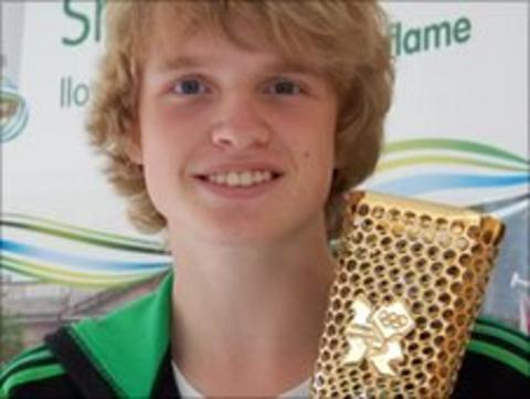 Eddie Graver with the Olympic torch prototype