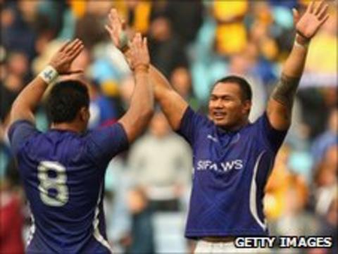 George Stowers and Taiasina Tuifu'a celebrate Samoa's victory