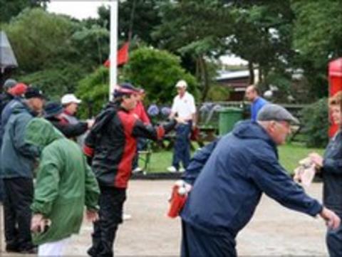 Petanque players in action