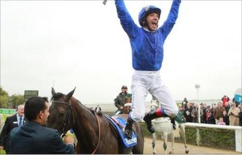 Frankie Dettori celebrates his win