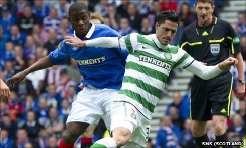 Rangers midfielder Maurice Edu and Celtic midfielder Beram Kayal