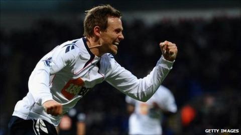Matt Taylor celebrates scoring a goal for Bolton Wanderers