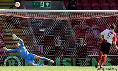 Craig Tully misses a penalty in a penalty shoot-out