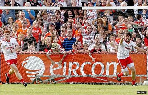 Peter Harte and goalscorer Joe McMahon celebrate during the qualifier against Armagh at Healy Park