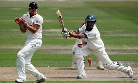 Nick Compton evades Moeen Ali's drive