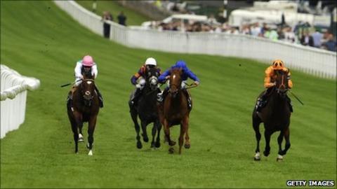 Frankel (left) leads from Canford Cliffs (right)