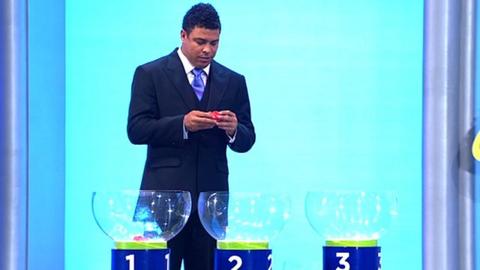 Ronaldo asists with the qualifying draw for the 2014 World Cup