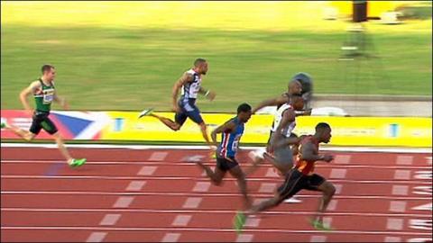 Dwain Chambers wins the 100m at the UK trials