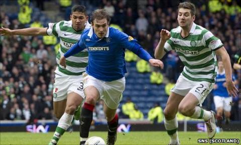 Emilio Izaguirre and Charlie Mulgrew in action against Rangers