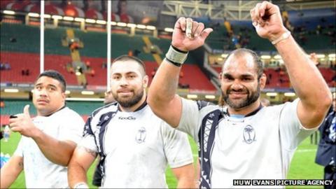 Deacon Manu (right) celebrates Fiji's draw with Wales in November 2010