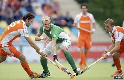Rogier Hofman and Billy Bakker of the Netherlands close in on Ireland's Conor Harte