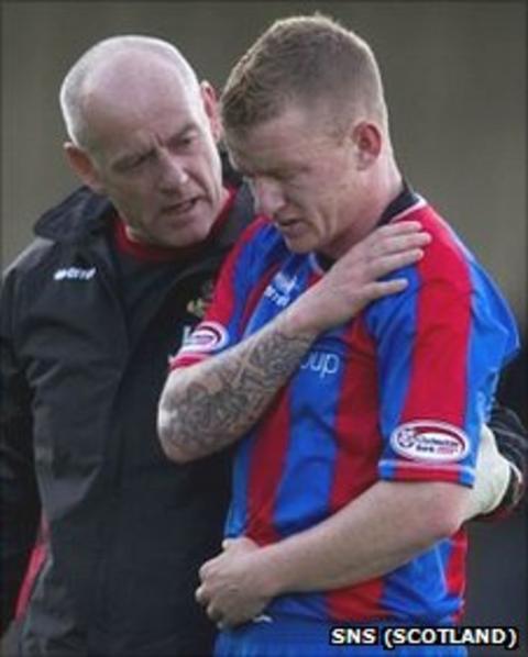 Jonny Hayes leaves the pitch at Somerset Park