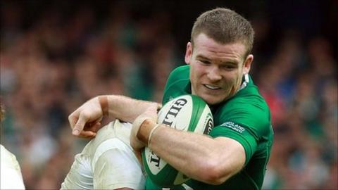 Gordon D'Arcy is tackled during the defeat by England on Saturday