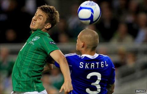 Kevin Doyle and Martin Skrtel